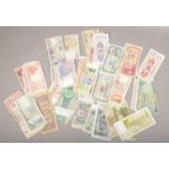 Approximately 50 assorted World banknotes.