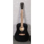 A Swift acoustic guitar. Black with cream bindings and having soft case.