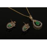 A 9ct gold emerald and diamond earring and pendant on chain set. Earrings 13mm, 1.37 grams,