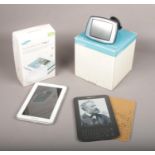 A collection of electronic equipment, to include Amazon Kindle, Samsung Galaxy Tab 2 and a Garmin