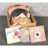 A box of vinyl records and 45 rpm, Diana Ross, Isley Brothers, Gladys Knight & the pips examples