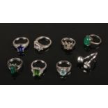 Eight silver dress rings including stained chalcedonny and coloured cubic zirconias etc.