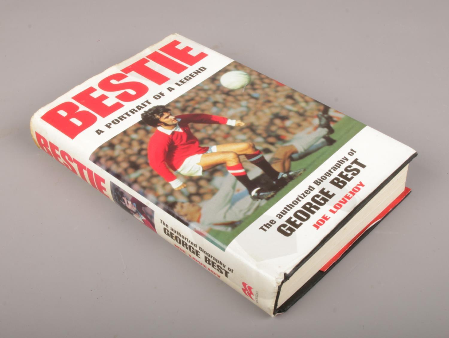 Bestie, A Portrait Of A Legend, biography by Joe Lovejoy. With autographs to interior from George