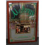 An advertising pub mirror, Malonys Irish Whiskey, 80cm x 54cm. Provenance; Lathom Hall, Liverpool.