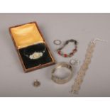 A collection of silver jewellery to include wristwatch, bangle, coin bracelet etc.