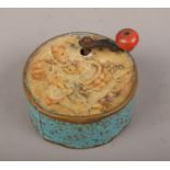 A Manivelle circular music box, with lithograph of children at play. Working condition.