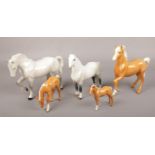 Five Beswick figures of horses. Good condition.