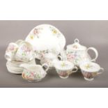 A Royal Doulton Arcadia pattern bone china six part teaset.