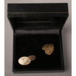 A pair of 9 ct Gold Cufflinks.