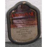 A Thomas Greenall's Original Cask Ale advertising mirror in ebonised frame, 48cm x 36cm. Provenance;