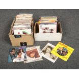 Two boxes of 45rpm records, mainly pop.