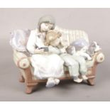 A Lladro porcelain figure group ' Big Sister' 5735 (approx 22 cm wide)