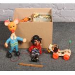 A box of vintage toys, Wooden Pull along goods train, Fisher price wooden pull along dog, Bendy Toys