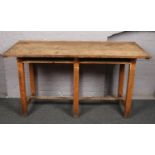 A 1960s Science Laboratory desk with Iroko top, 1836cm x 76cm, 100cm high.