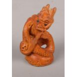 A box wood Japanese Netsuke dragon (approx 5 cm height)