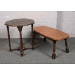 A coffee table with hammered copper top, along with a mahogany window table.