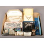 A tray of mainly costume jewellery, to include simulated pearls, white paste necklaces and