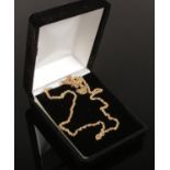 A 9 ct gold necklace (approx 10 cm length)