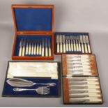 Three cased silver plated cutlery sets including Walker 7 Hall fish knives and forks, fish servers