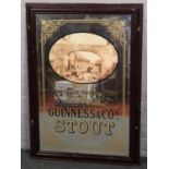 An advertising bevelled pub mirror Guinness & Co's Stout, 91cm x 60cm. Provenance; Lathom Hall,