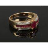 A 9ct gold, ruby and diamond St George cross ring. Gross weight 4.8 grams, Size Q.