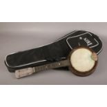 A vintage ukulele in modern case.