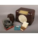 A group of collectables, to include Bush bakelite cased radio, Velos barrel, Harlequin cigars and