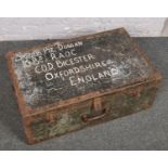 A military trunk with soldiers particulars inscribed and containing a collection of vintage ice