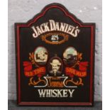 A reproduction painted wooden Jack Daniels Old No. 7 advertising board, 81cm x 60cm. Provenance;