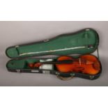 A cased Skylark student's violin.