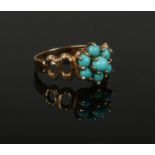 A vintage 9ct gold turquoise cluster ring, size J.