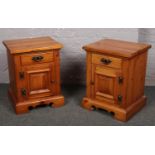 a pair of solid pine bedside cabinets.