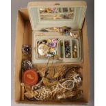 A box of costume jewellery including filigree Madeira souvenir galleon, wristwatches and brooches