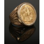 A 9ct 1914 full sovereign ring, size S, 17g