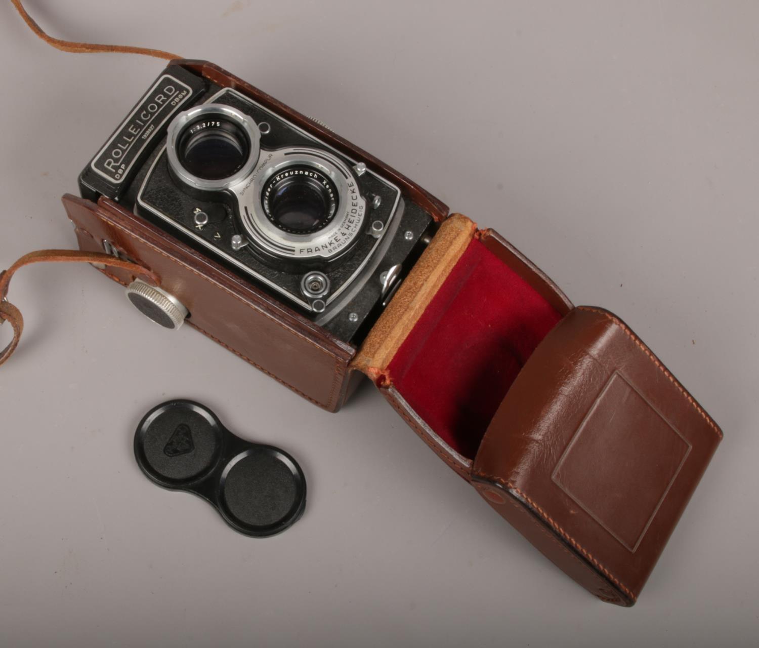 A Rolleicord reflex camera by Franke & Heidecke in original leather cover.