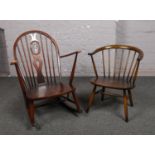 An Ercol Prince of Wales rocking arm chair, along with an Ercol arm chair. Wear to rocking chair.
