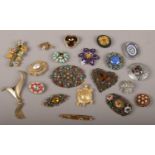 Twenty vintage costume jewellery brooches including Scottish, micro mosaic and spray brooches etc.