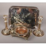 A pair of old Sheffield plate table candlesticks, a wine coaster, a silver plated basket with