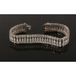 A cased silver bracelet set with round and marquis cut cubic zirconia stones, 19.5cm.