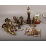 A group of collectables, to include steam engine, lighthouse lamp, butterfly display etc.