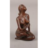A Japanese fruitwood erotic Netsuke (approx 6 cm height)