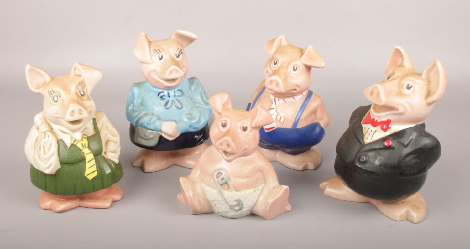 Five Wade ceramic Natwest piggy banks.