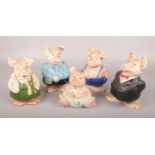 Five Wade ceramic Natwest piggy banks.