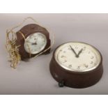 A Smiths bakelite wall clock, along with a Smiths bakelite electric alarm clock.