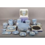 A collection of Wedgwood Jasperware including a boxed three colour diced goblet in memoration of the