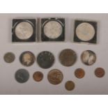 A collection of British pre decimal coins including two William IV silver half crowns, two