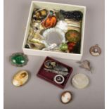A box of mixed costume jewellery and collectables including cameo, mother of pearl brooch and
