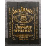 A reproduction painted wooden Jack Daniels Old No.7 advertising board, 56cm x 41cm. Provenance;