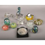 A collection of glass paperweights, to include Wedgwood polar bear, ducks etc.