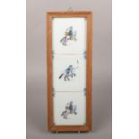 Three 19th century polychrome delft tiles framed as one. Each painted to depict a mounted soldier,
